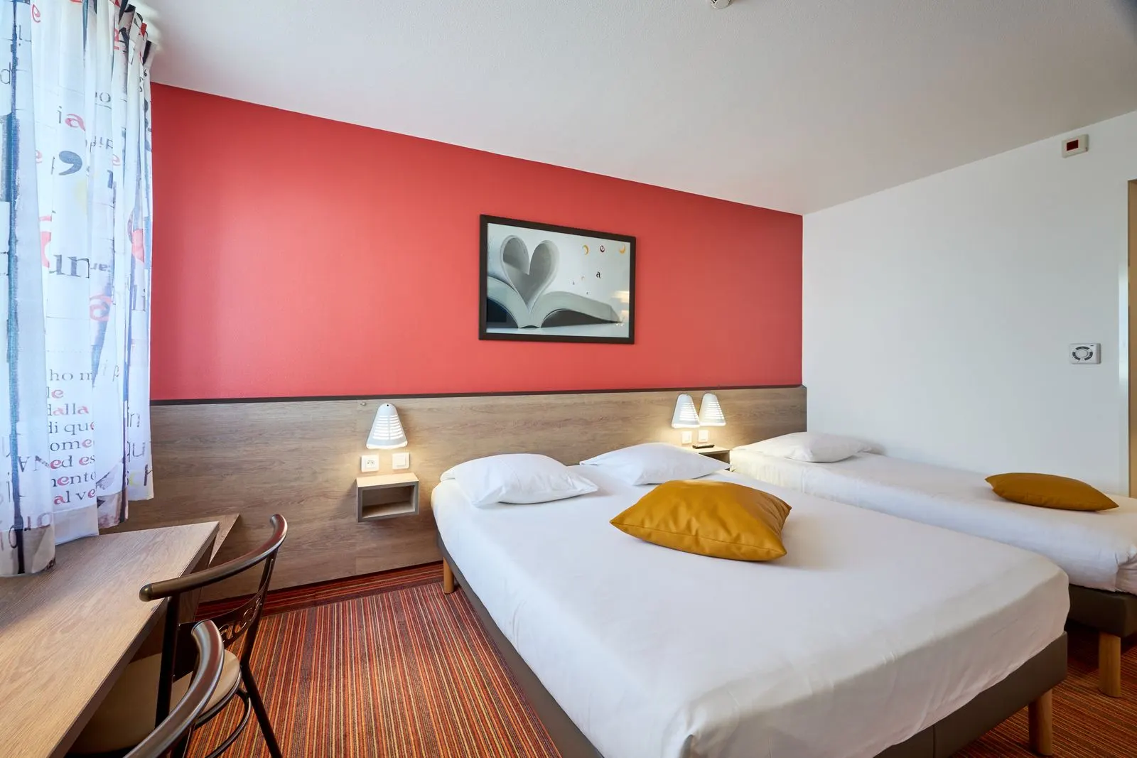 Couchages de la chambre triple de l'Hôtel Goodwood